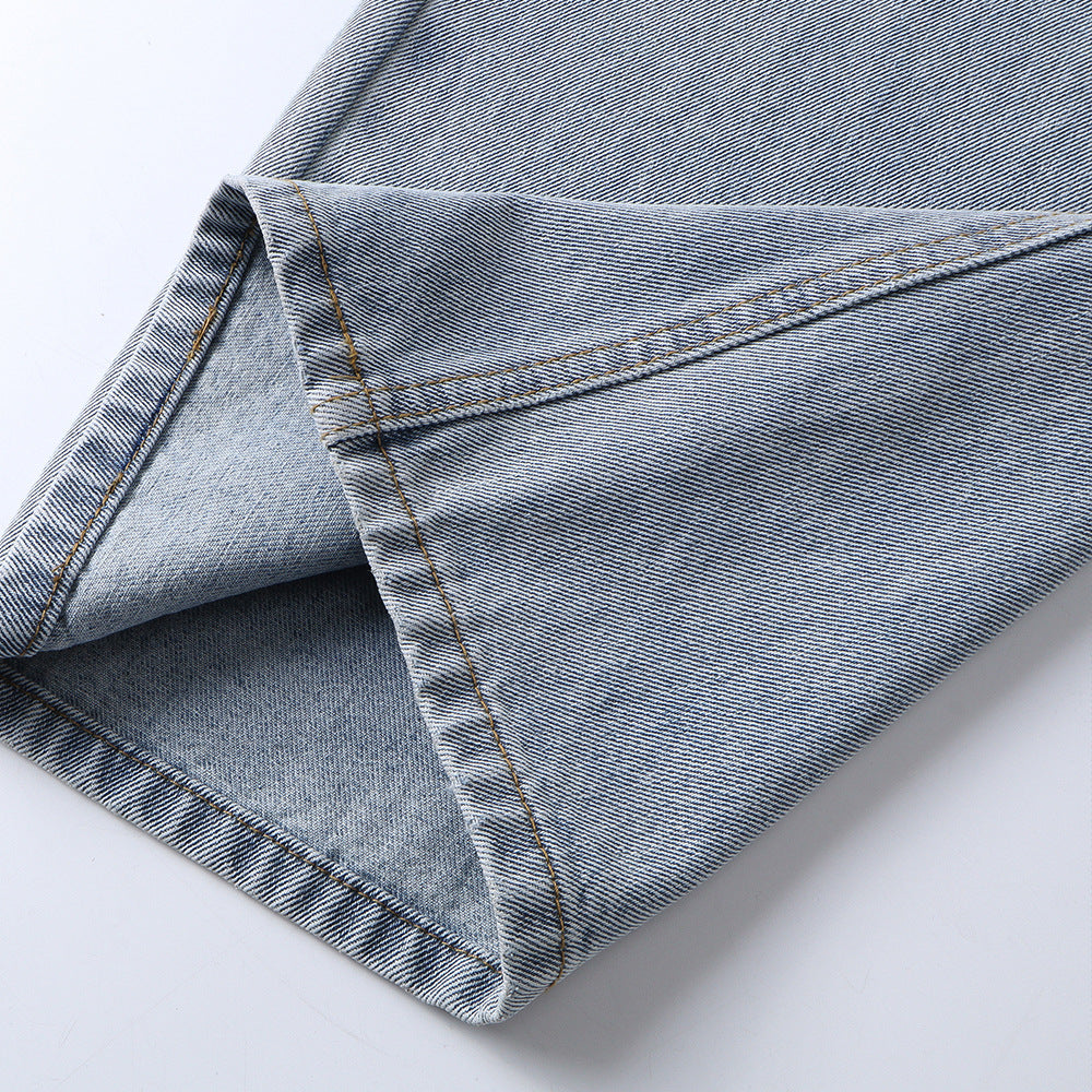 Graffiti printed washed denim jeans